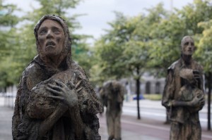 The sculpture is a commemorative work dedicated to those Irish people forced to emigrate during the 19th century Irish Famine.