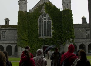 The courtyard of NUI Galway, with manicured lawns and Gothic Revival style architecture, typical of Anglo-Irish ascendancy architecture. 