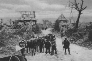 An Indian cavalry patrol in the ruins of Mametz, Pas-de-Calais in July, 1916. Cavalrymen of day bygone amid destruction wrought by modern artillery. 
