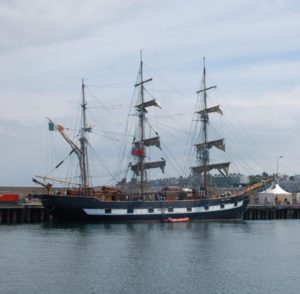 A modern photo of a ship in a harbor